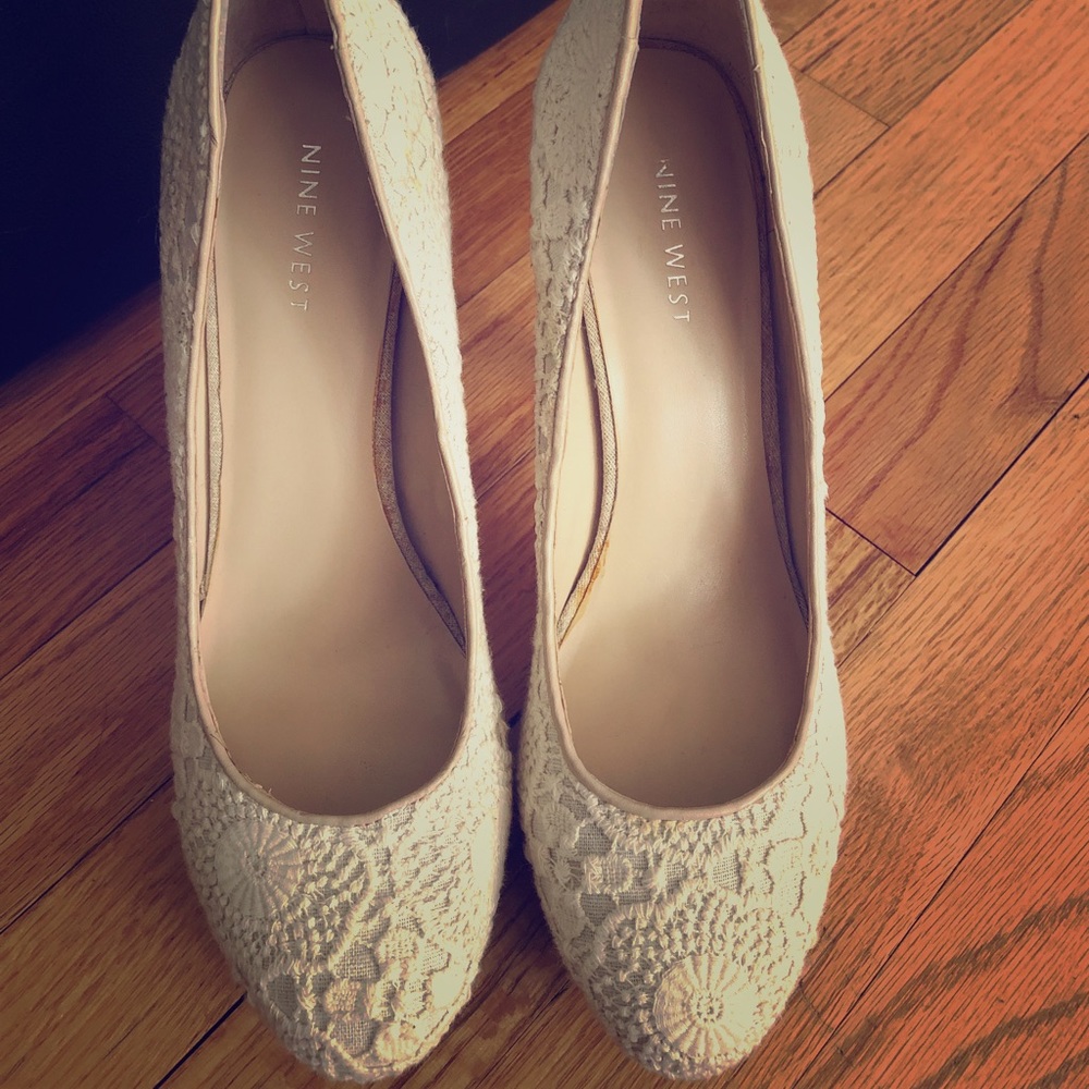 Nine West lace pumps.